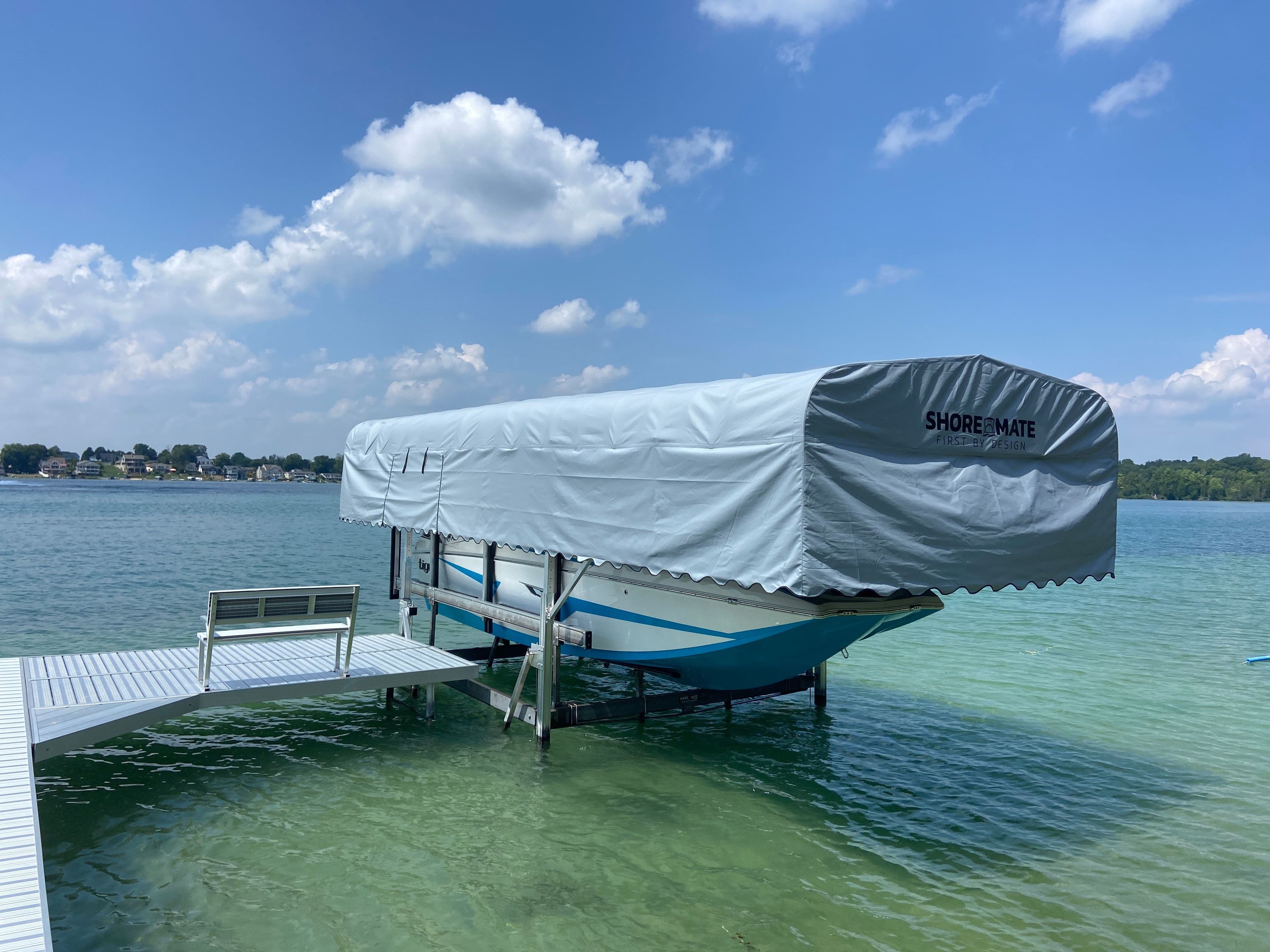Shoremate dock and boat lift on lake in Whitehall Michigan